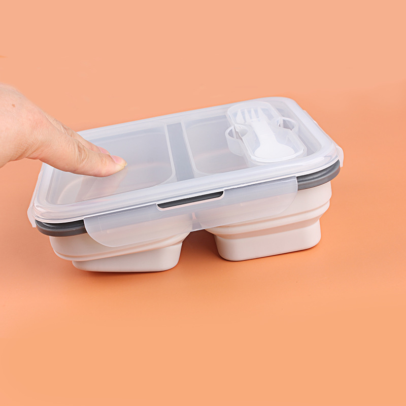 Two-compartment portable foldable silicone food storage container (fork included)